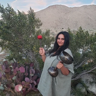 Leydin smiling in the desert.